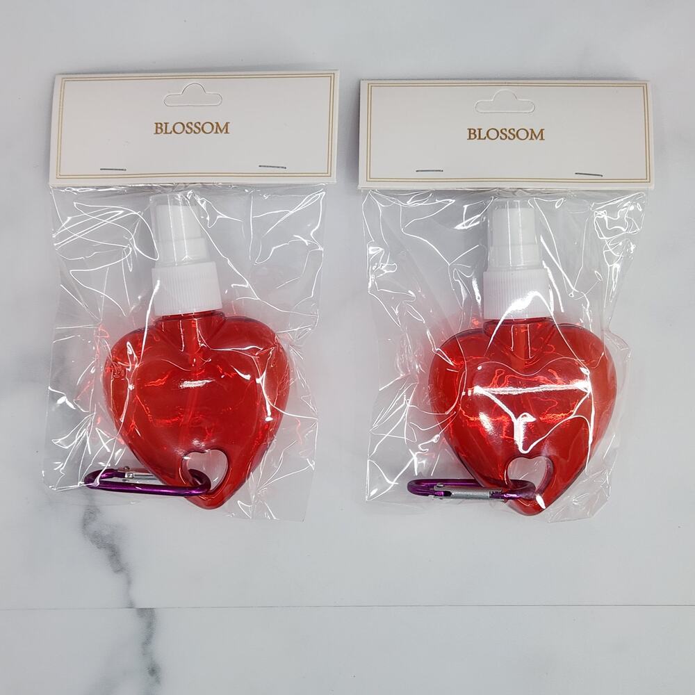 2 Heart Shaped Translucent Spray Bottles with a Carabiner - Red